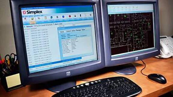TrueSite interface displayed on two computer monitors